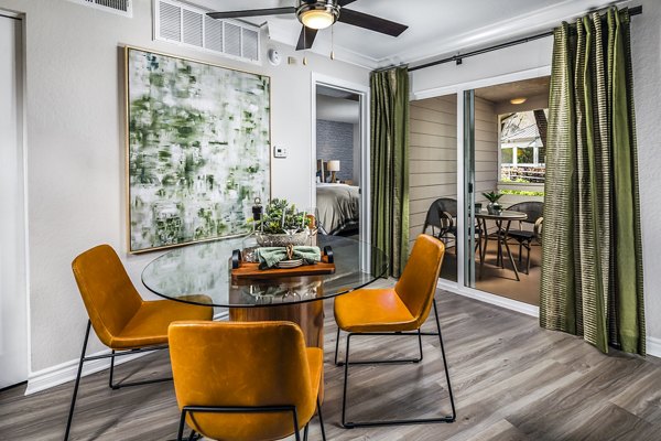 Elegant dining room with contemporary furnishings at Artisan Laguna Beach Apartments, highlighting coastal living