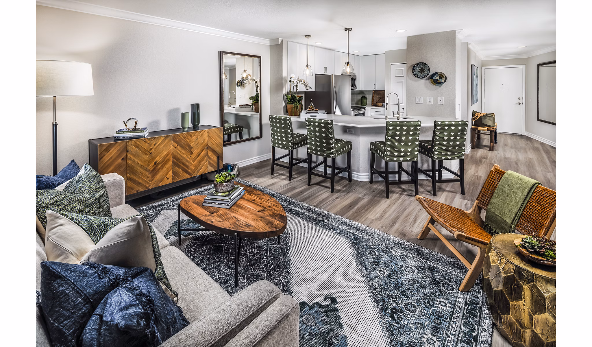 Modern living room with stylish decor at Artisan Laguna Beach Apartments, featuring ocean views and spacious seating area
