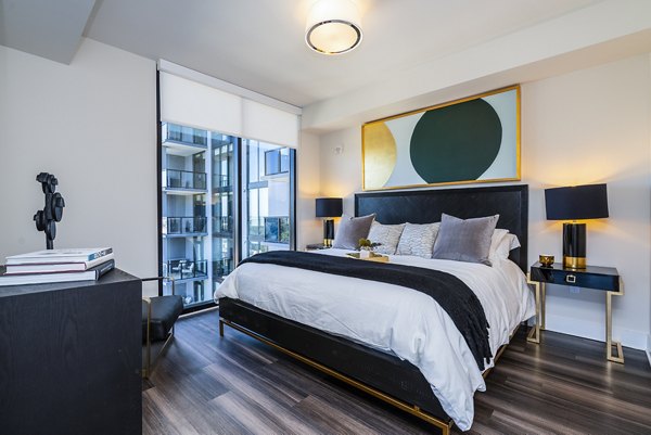 Cozy bedroom with modern decor at Ascent Midtown Apartments