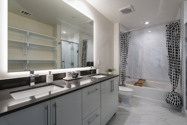 Modern bathroom with sleek fixtures at Ascent Midtown Apartments, a luxury Greystar community in the heart of the city
