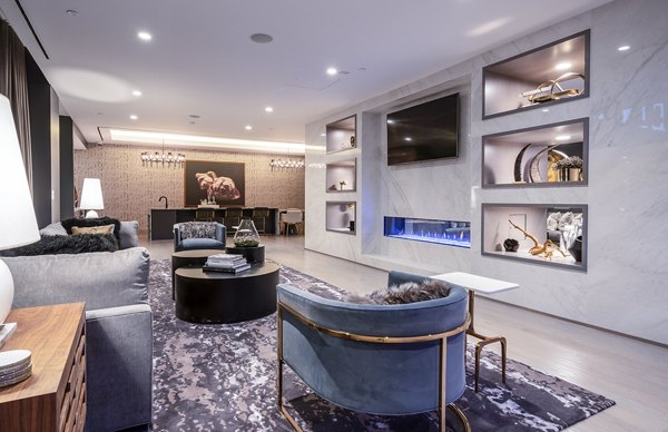 Clubhouse featuring modern design and luxury seating at Ascent Midtown Apartments
