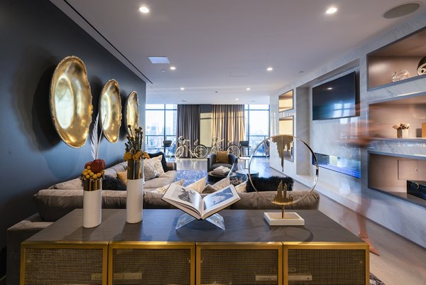 Clubhouse featuring modern decor and lounge areas at Ascent Midtown Apartments
