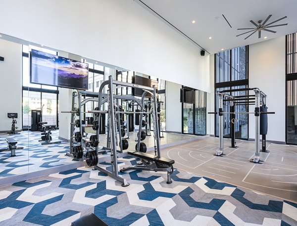 State-of-the-art fitness center with modern equipment at Ascent Midtown Apartments, ideal for luxury living and wellness