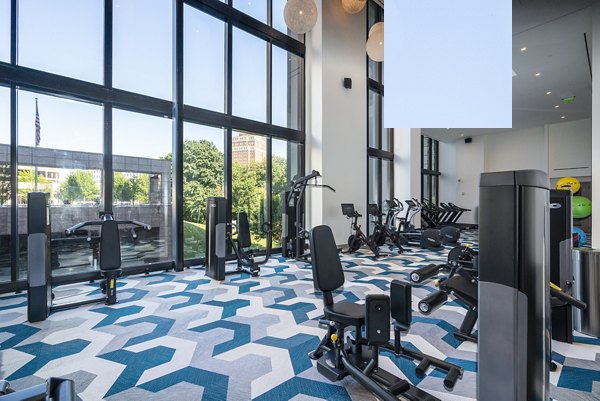 State-of-the-art fitness center at Ascent Midtown Apartments with modern equipment and spacious workout areas