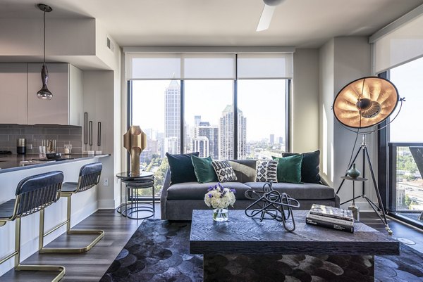 Spacious living room with modern furniture in Ascent Midtown Apartments, luxury living in the heart of the city Perfect for comfort and style