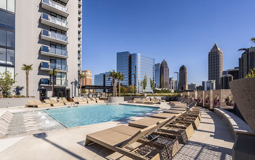 Rooftop infinity pool at Ascent Midtown Apartments offering skyline views in a luxury setting