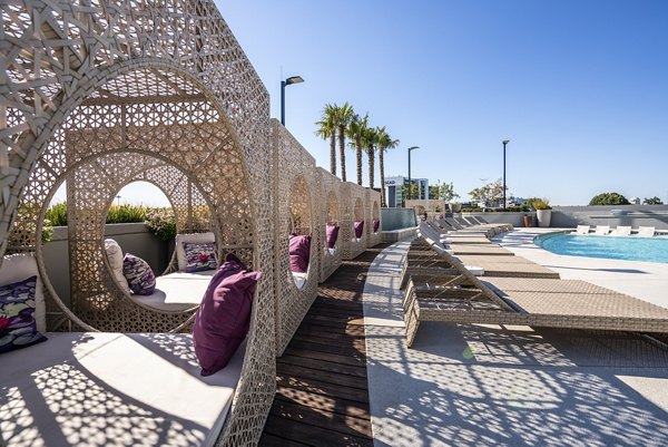 Rooftop pool with skyline views at Ascent Midtown Apartments, offering luxury amenities in a prime urban location