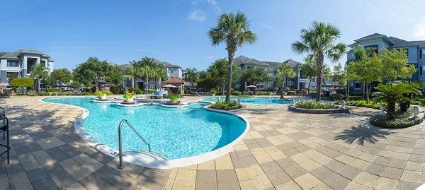 Inviting outdoor pool area at Mandalay at Shadow Lake Apartments, perfect for relaxation