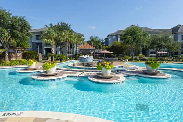 Resort-style pool at Mandalay at Shadow Lake Apartments offering relaxation and leisure