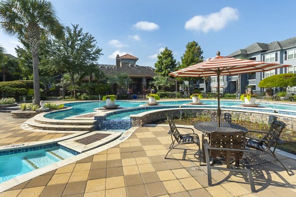 Luxurious resort-style pool at Mandalay at Shadow Lake Apartments, perfect for relaxation and leisure in a premier residential community