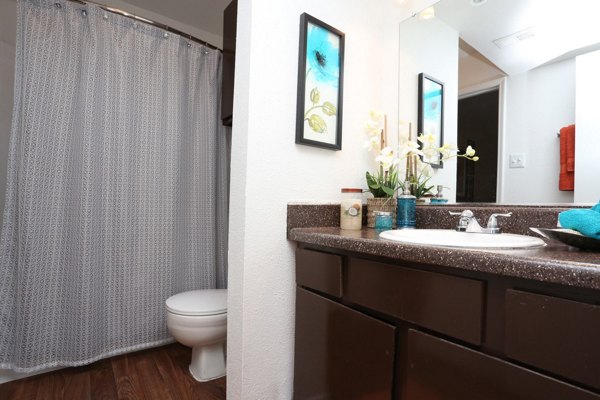 Bathroom with modern fixtures and sleek design in Lake Vue Apartments