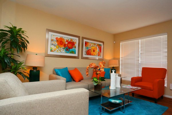 Spacious living room with modern decor at Lake Vue Apartments, showcasing luxury apartment design in a Greystar-managed property