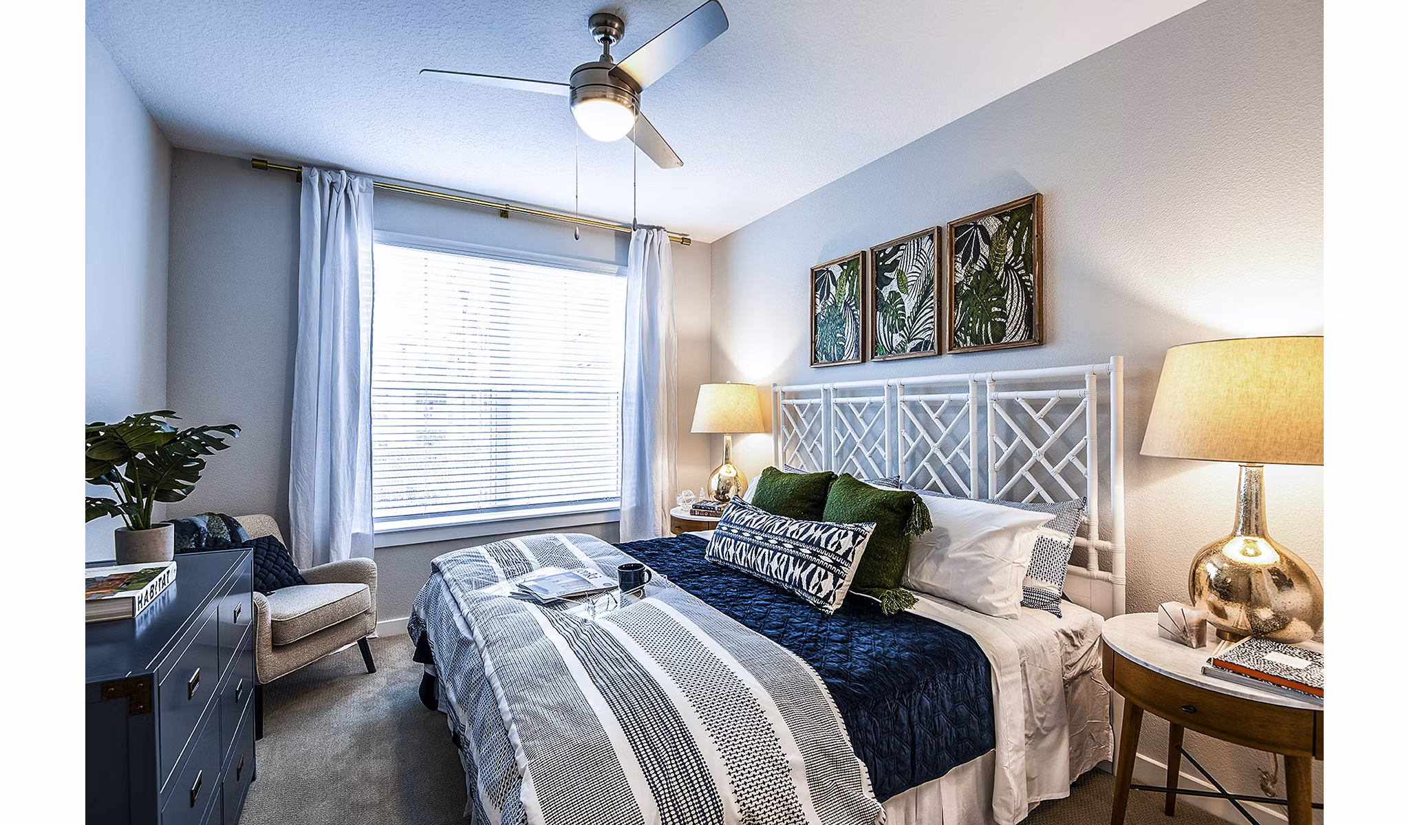 Bedroom featuring modern design and elegant furnishings at Overture Dr Phillips Apartments