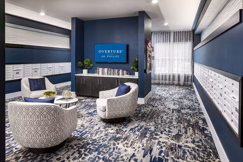Mail room equipped with modern package lockers at Overture Dr Phillips Apartments