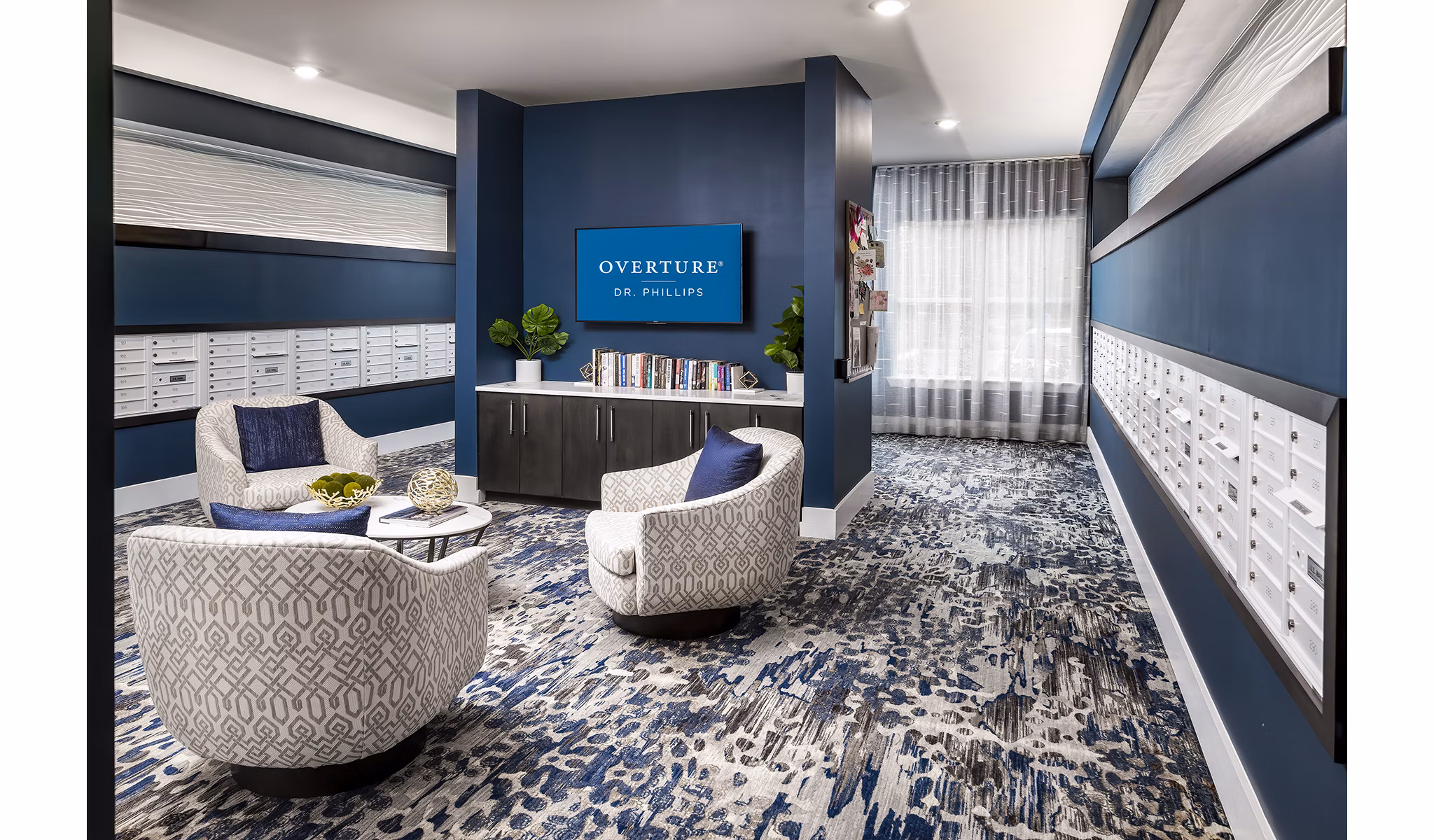 Mail room equipped with modern package lockers at Overture Dr Phillips Apartments