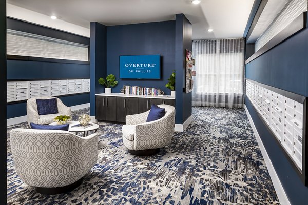 Mail room equipped with modern package lockers at Overture Dr Phillips Apartments