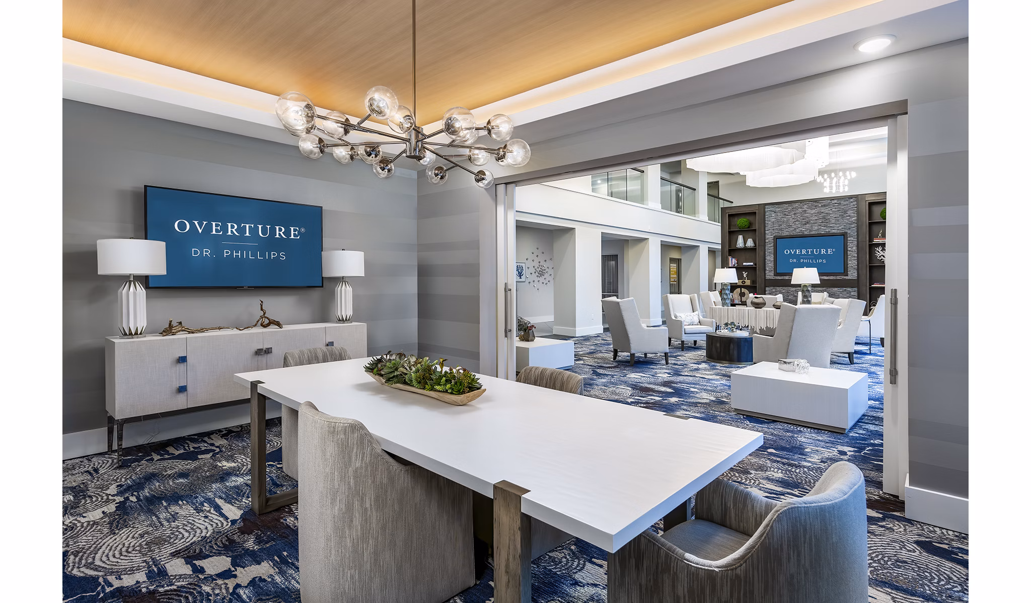 Overture Dr Phillips: Modern meeting facility with sleek design and ample seating, ideal for hosting business gatherings and events