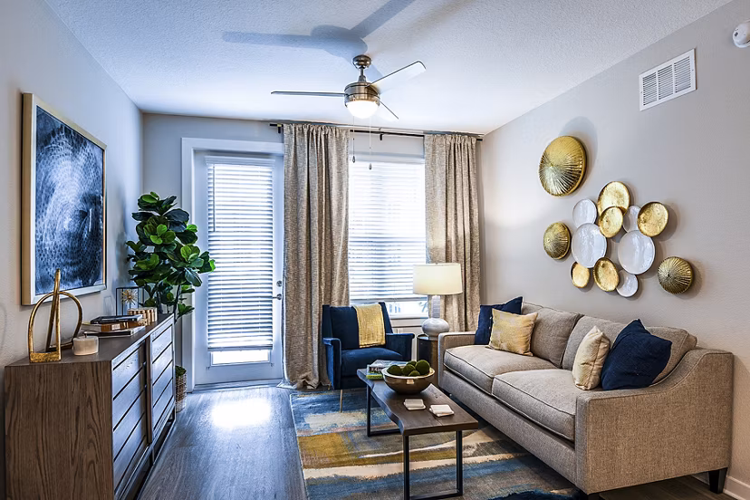 Spacious living room with modern decor in Overture Dr Phillips Apartments