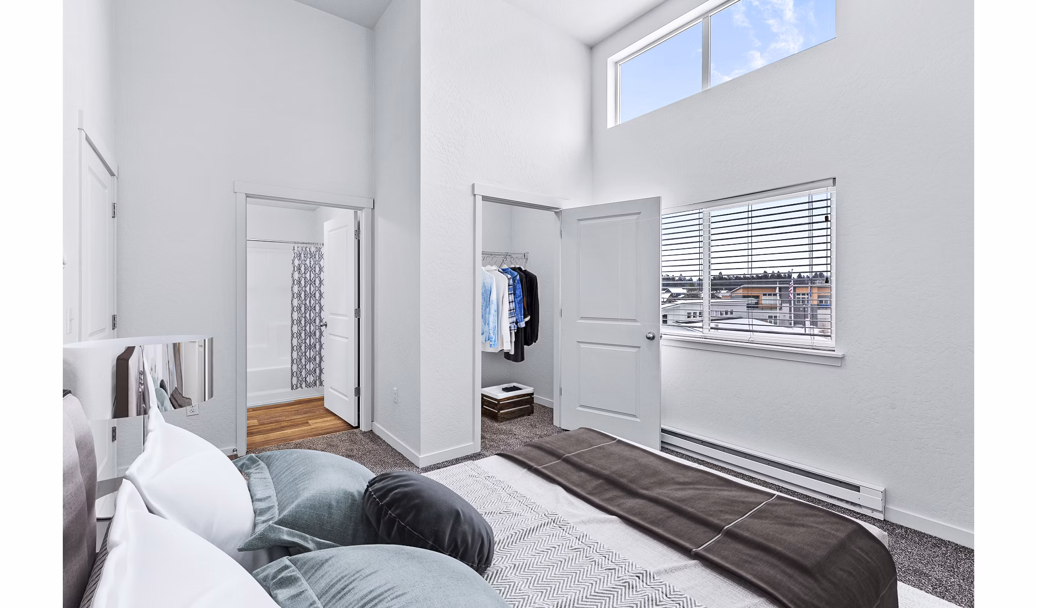 Stylish bedroom with contemporary decor at The Northern at Coeur d'Alene Place Apartments