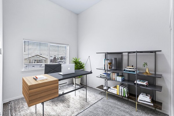 Home office with modern desk and ergonomic chair at The Northern at Coeur d'Alene Place Apartments