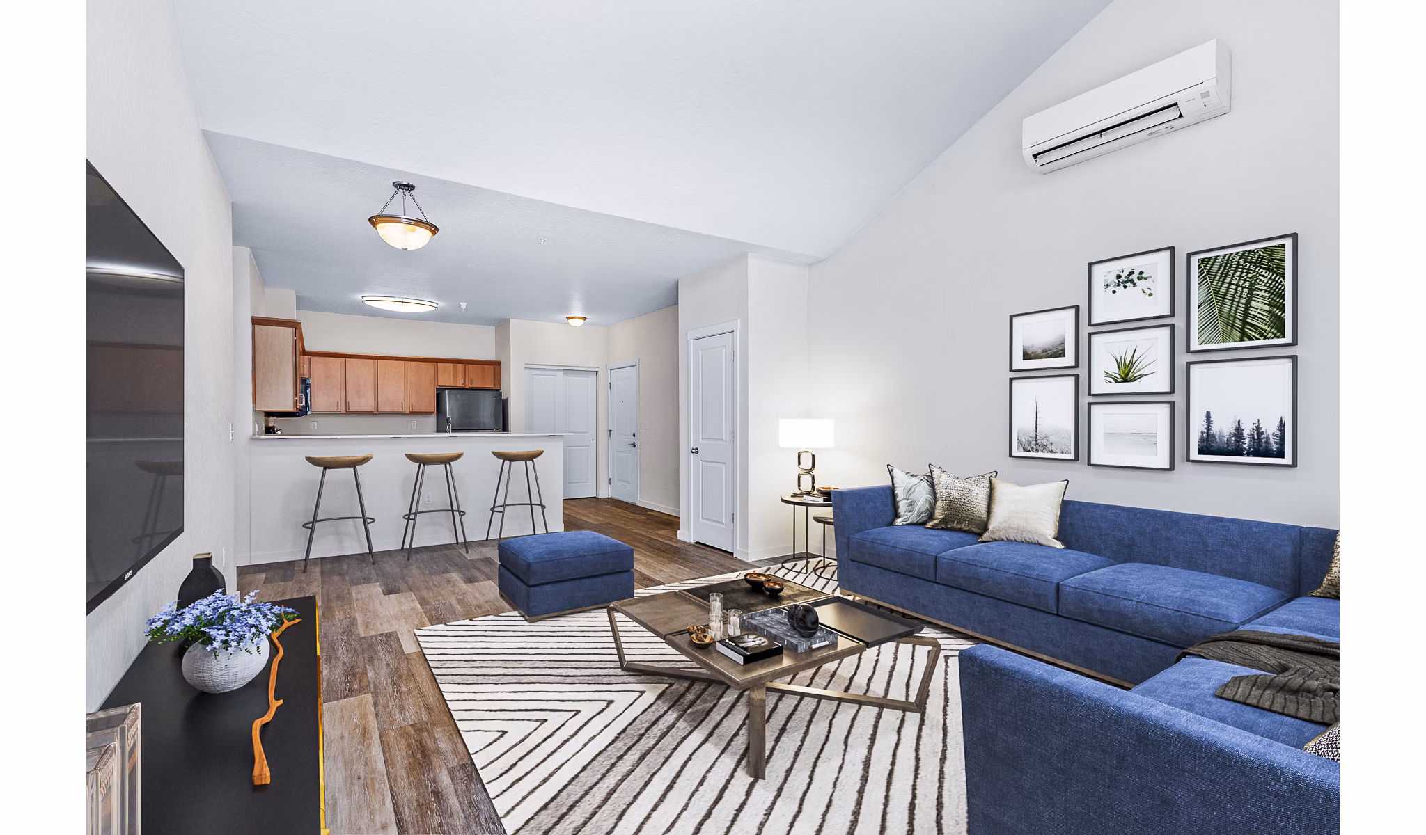 Spacious living room with modern decor at The Northern at Coeur d'Alene Place Apartments