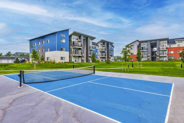 Outdoor tennis court at The Northern at Coeur d'Alene Place Apartments