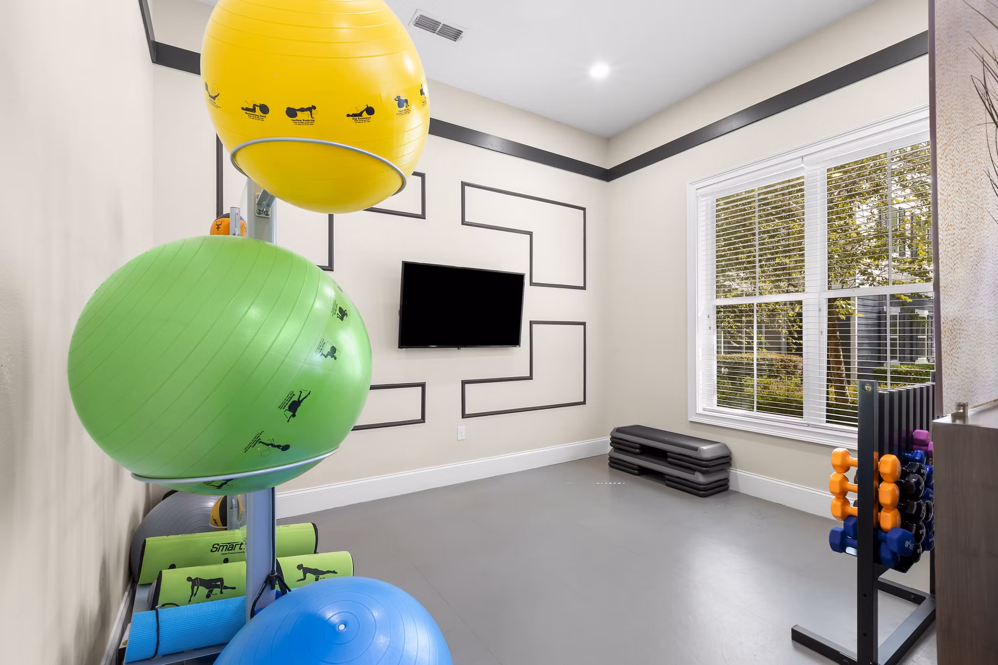fitness center at Album Monterey Pointe Apartments 