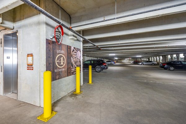 Secure covered parking garage at Hardy Yards Apartment Homes provides convenience and protection for residents' vehicles
