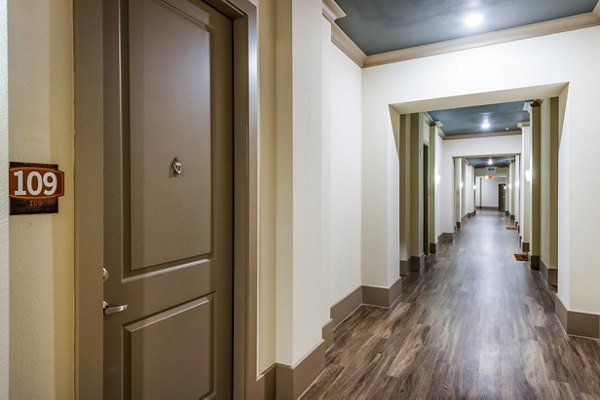 Hardy Yards Apartment Homes: Modern hallway with stylish lighting and contemporary design
