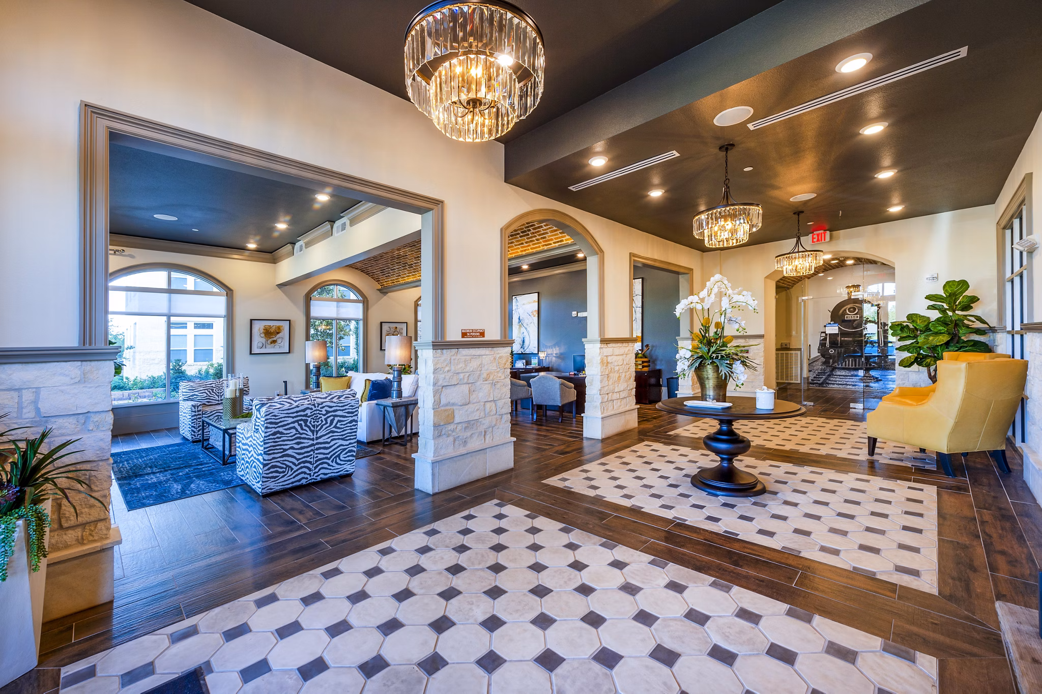 Modern clubhouse featuring chic seating and entertainment areas at Hardy Yards Apartment Homes