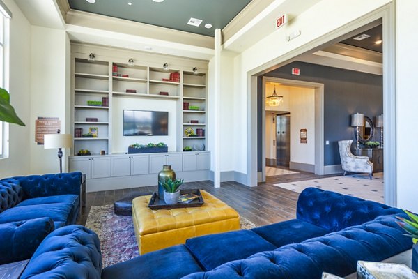 Clubhouse featuring modern decor and comfortable seating at Hardy Yards Apartment Homes