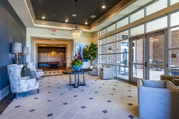 Clubhouse featuring modern design and entertainment areas at Hardy Yards Apartment Homes
