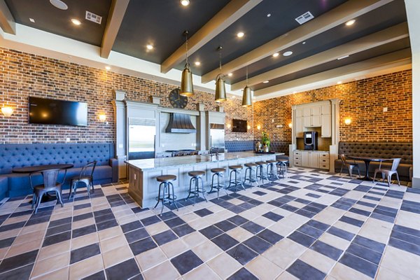 Modern clubhouse featuring sleek design at Hardy Yards Apartment Homes, ideal for social gatherings and relaxation
