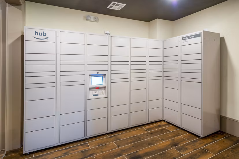 Parcel pickup locker at Hardy Yards Apartment Homes, a convenient amenity for residents to securely receive packages in luxury apartments