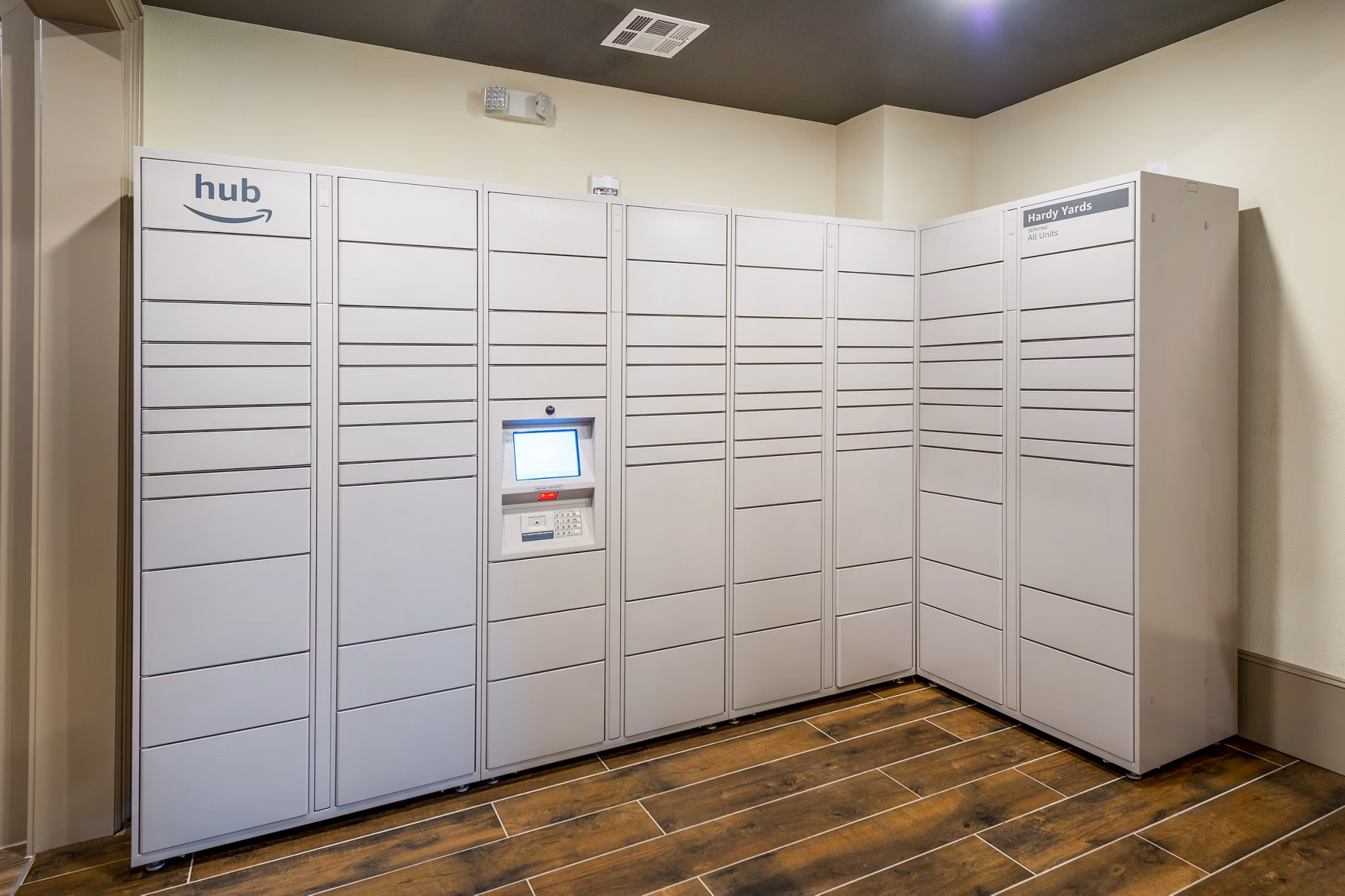Parcel pickup locker at Hardy Yards Apartment Homes, a convenient amenity for residents to securely receive packages in luxury apartments