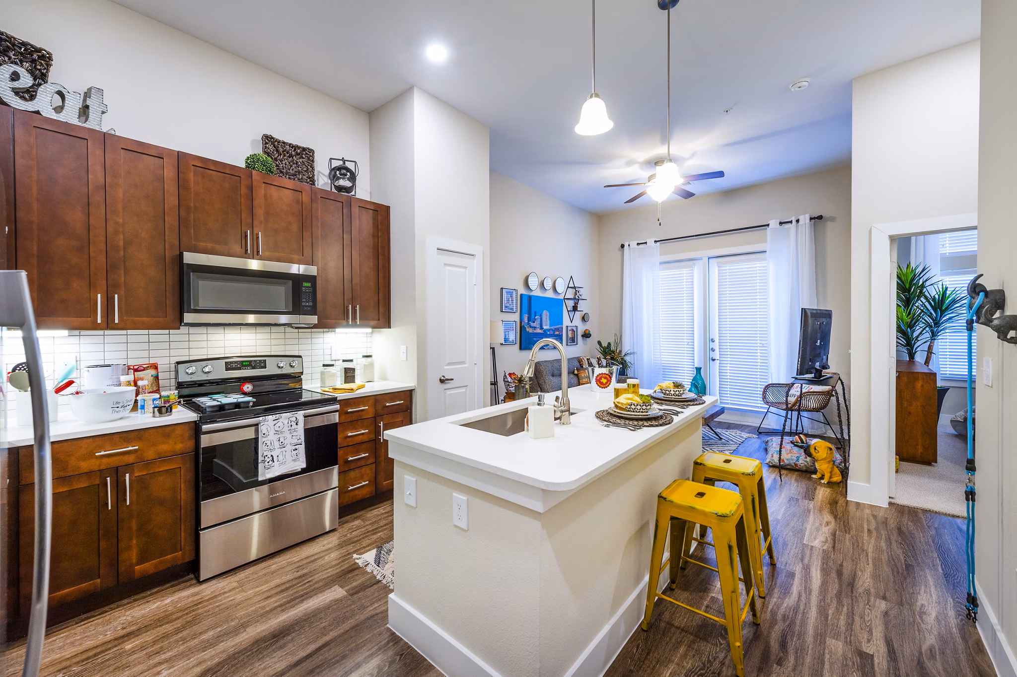 Modern kitchen with stainless steel appliances at Hardy Yards Apartment Homes, offering luxury apartment living in a vibrant community