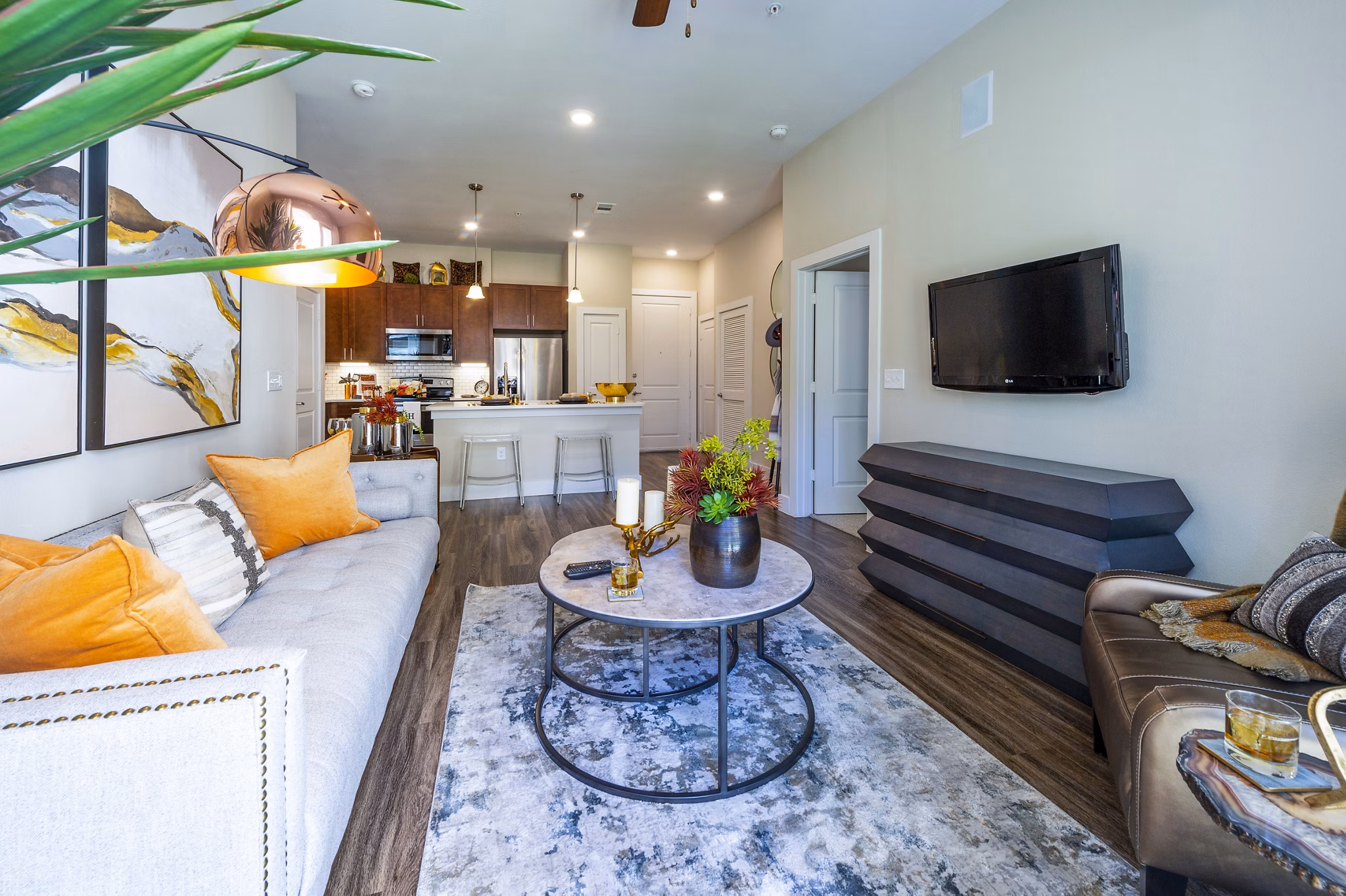 Spacious living room with modern furnishings at Hardy Yards Apartment Homes