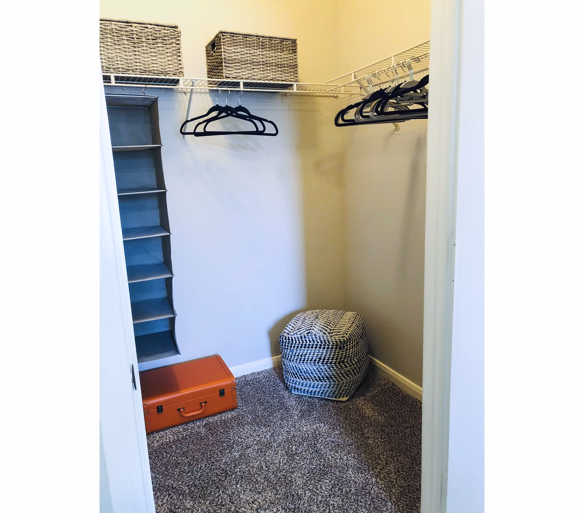Bedroom closet featuring custom shelving at Breakers at Windmill Lakes Apartments