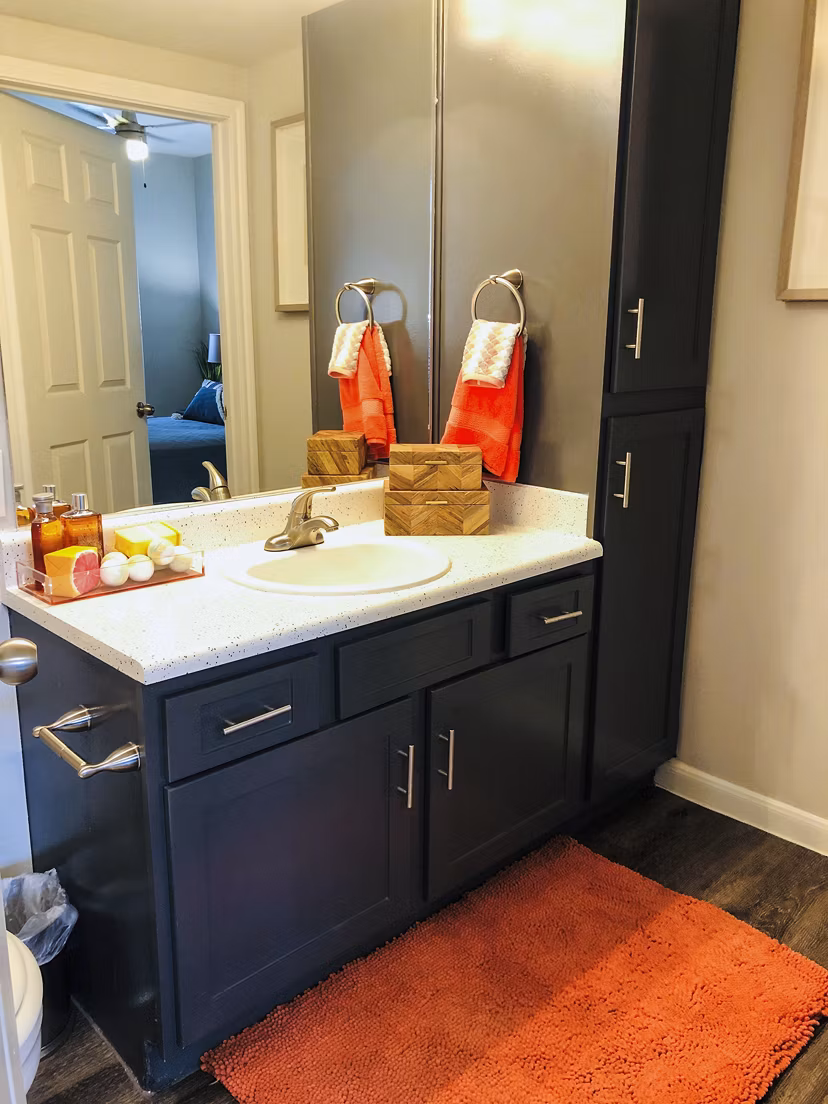 Bathroom featuring modern fixtures and a sleek design at Breakers at Windmill Lakes Apartments