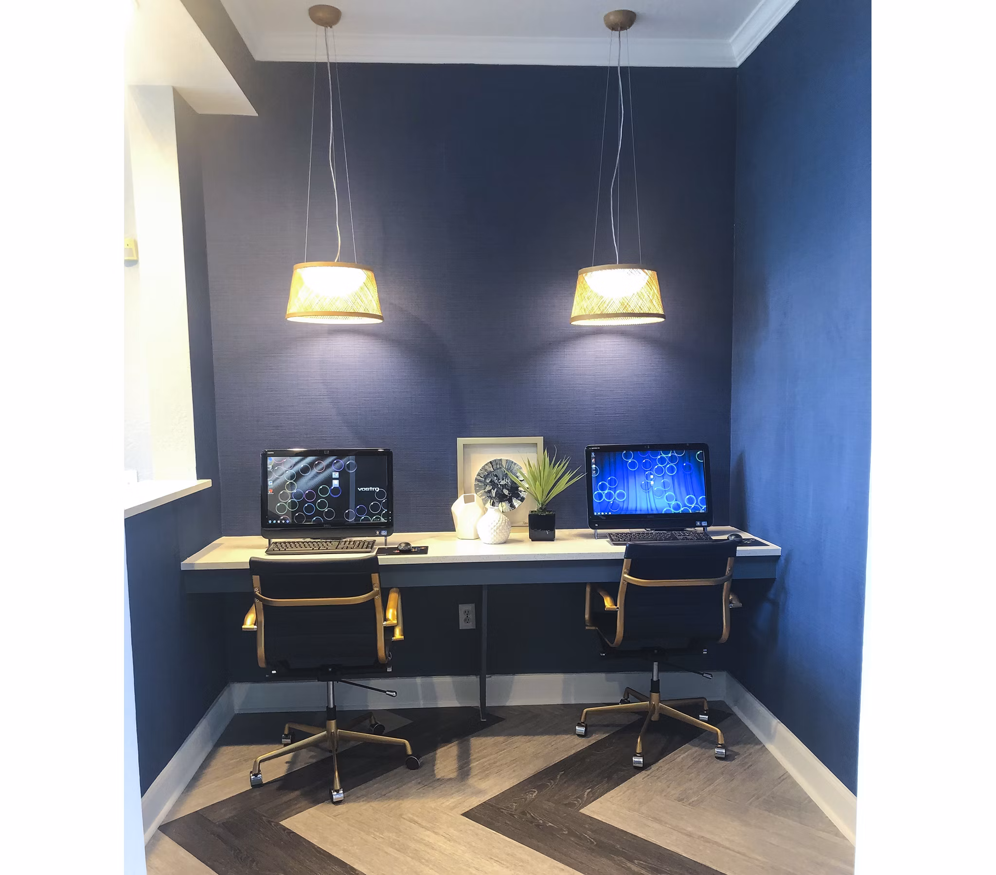 Business center with modern workstations at Breakers at Windmill Lakes Apartments, ideal for remote work and meetings