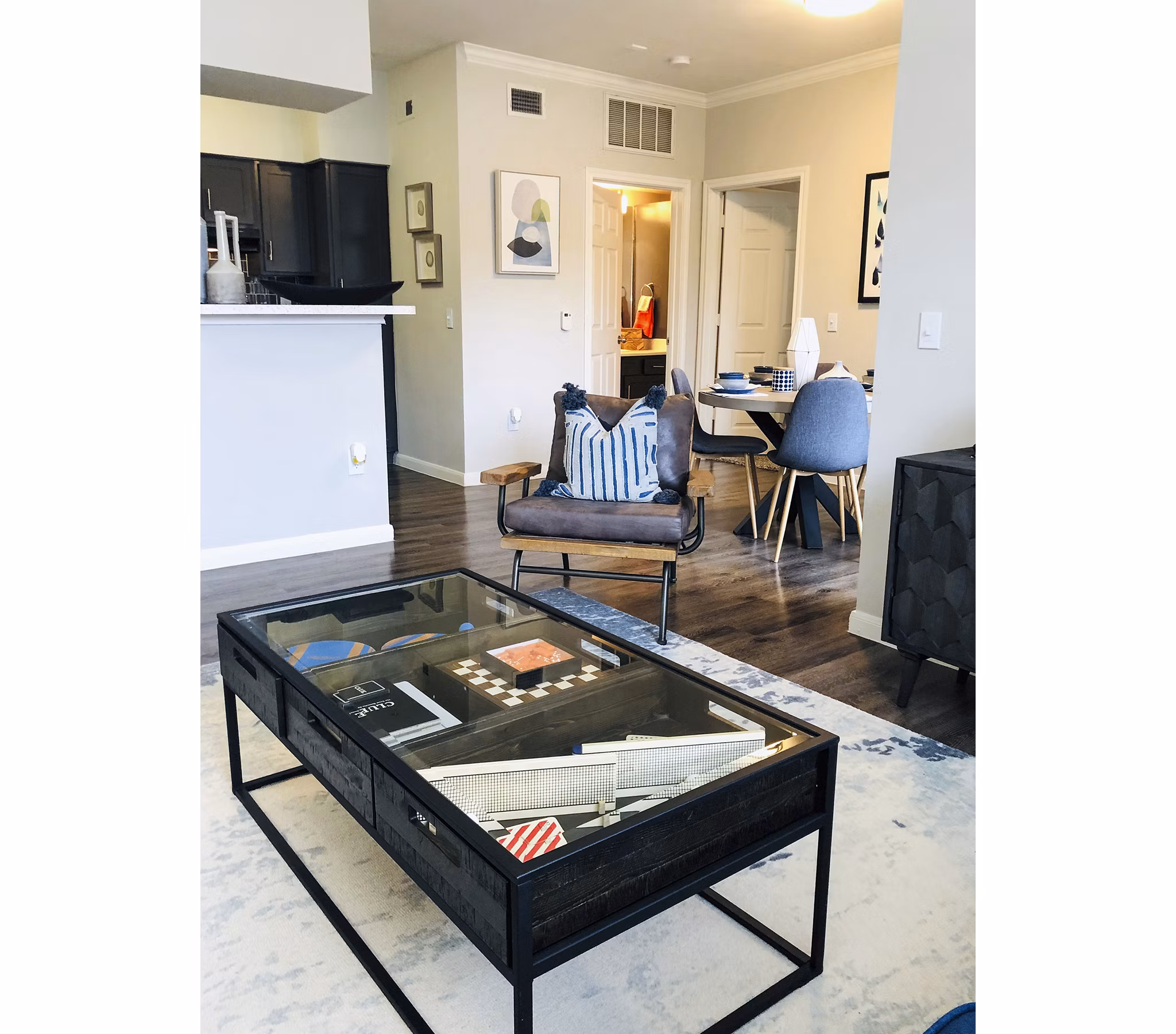 Modern living room with stylish decor at Breakers at Windmill Lakes Apartments