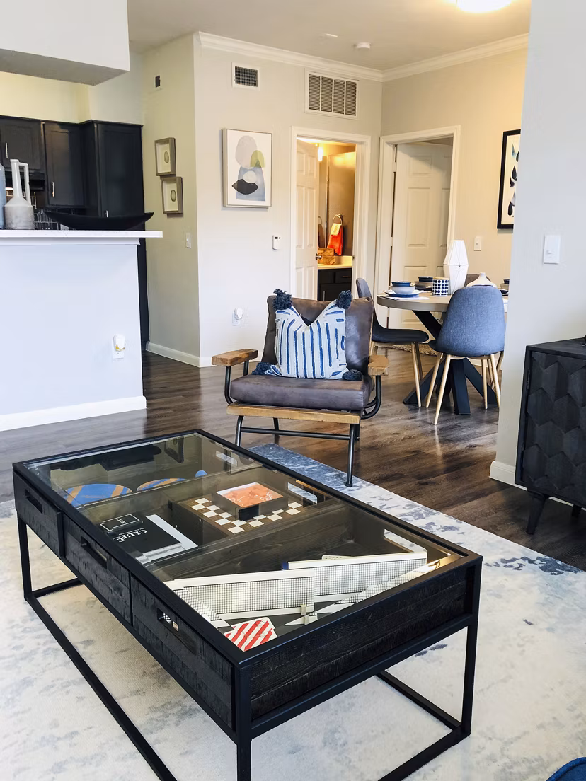 Modern living room with stylish decor at Breakers at Windmill Lakes Apartments