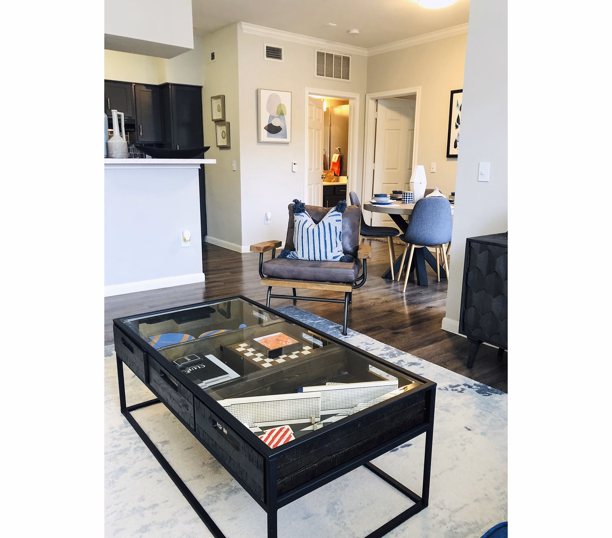 Modern living room with stylish decor at Breakers at Windmill Lakes Apartments