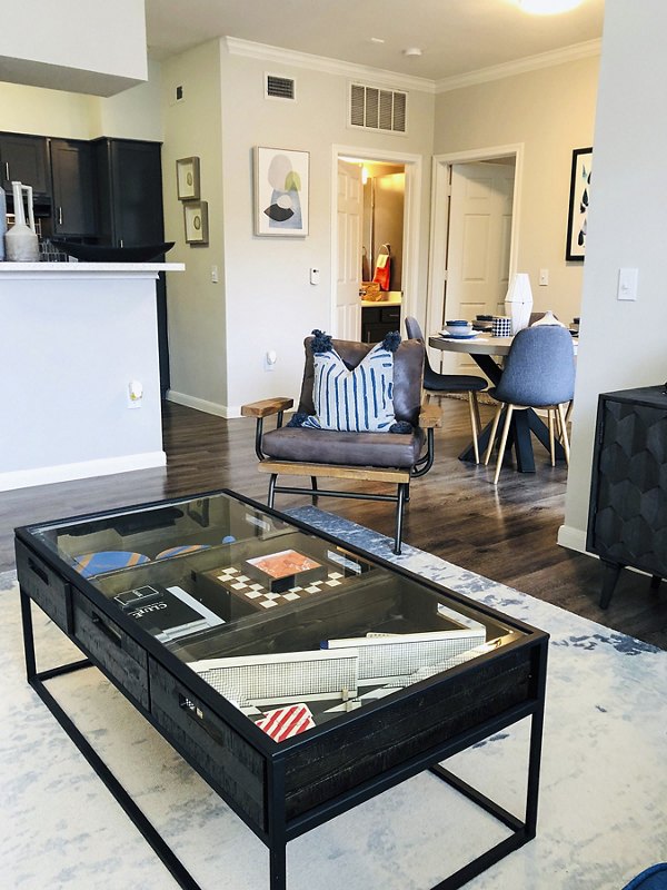 Modern living room with stylish decor at Breakers at Windmill Lakes Apartments