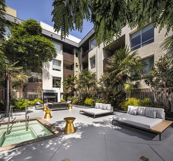 Luxurious hot tub at Alaya Hollywood Apartments offering relaxation and scenic views