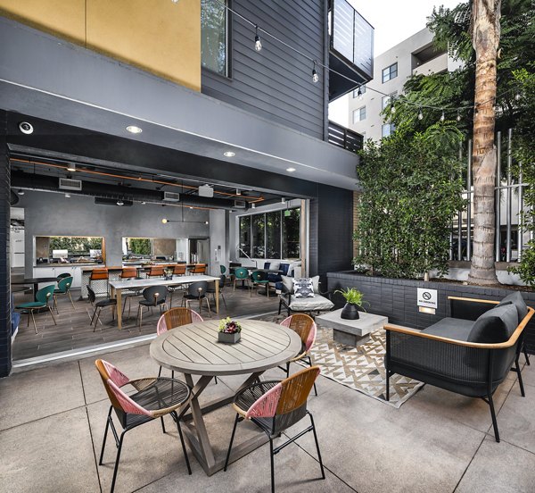 Stylish patio with outdoor seating at Alaya Hollywood Apartments