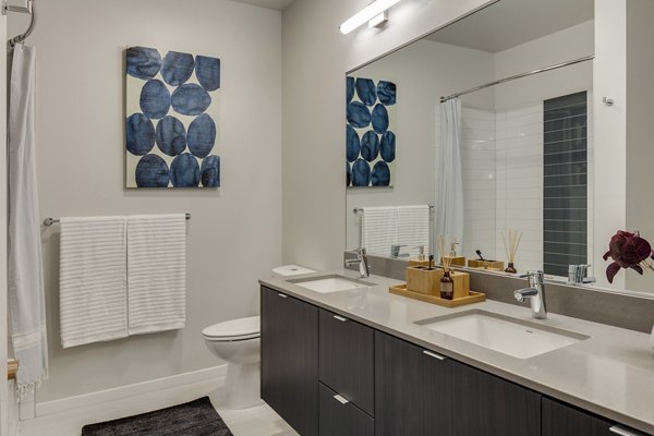 Modern bathroom with sleek fixtures at Sitka Apartments