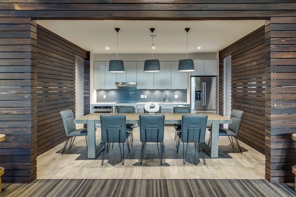 Clubhouse featuring luxury lounge and game area at Sitka Apartments