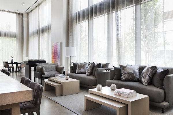 Clubhouse featuring modern design and comfortable seating at Grey House Apartments, perfect for resident gatherings and events