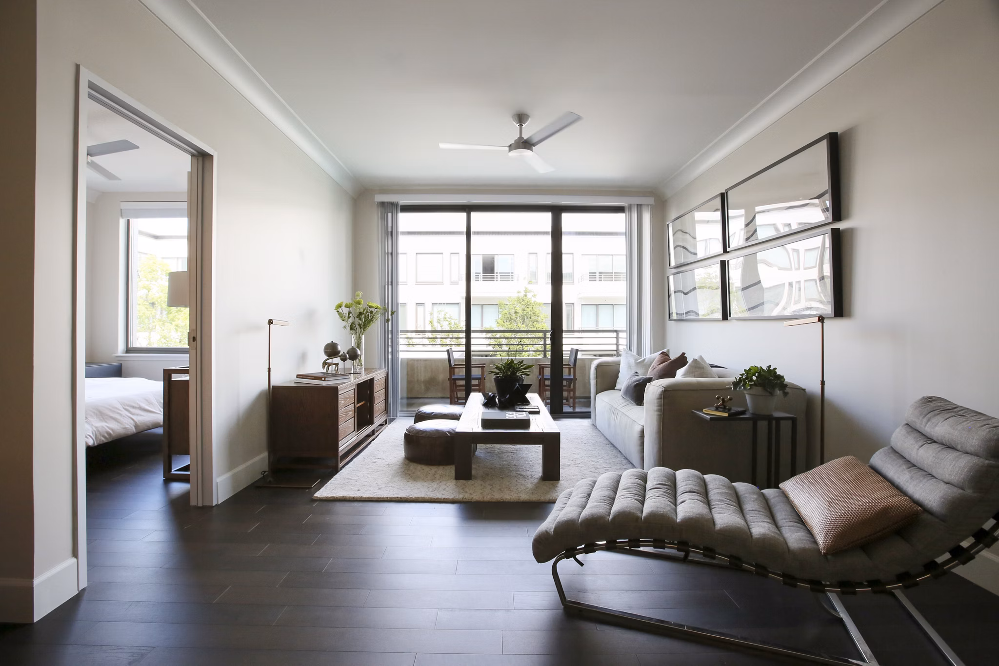 Spacious living room with modern decor in Grey House Apartments offering a luxurious living experience